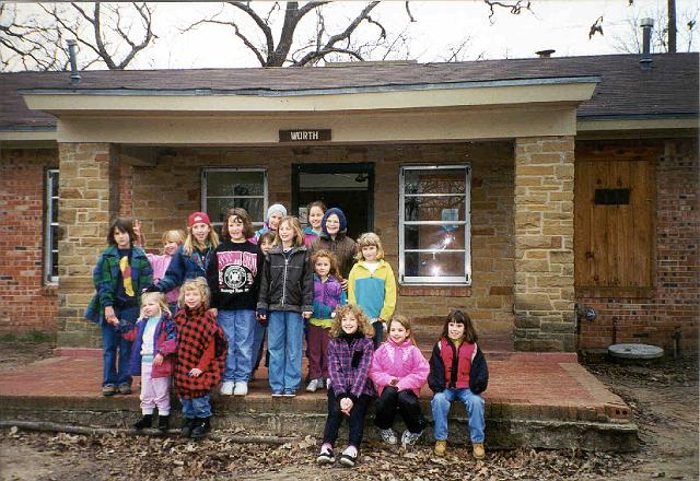 Princesses on Waco cabin porch 1.jpg